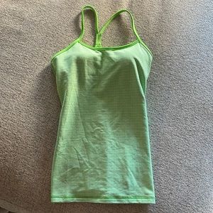 Lululemon green and white with built-in bra, tank top. $50. Size 8
